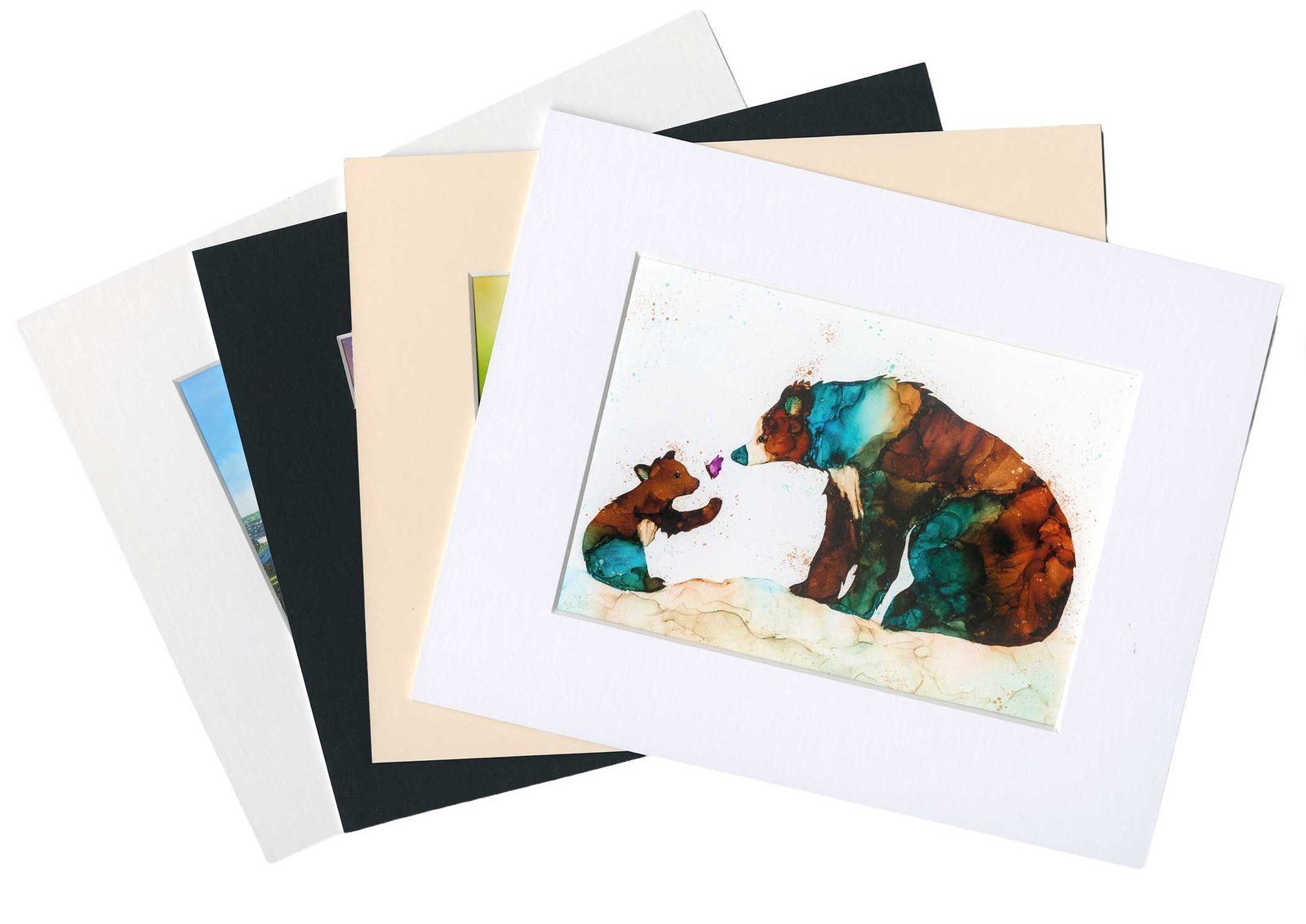 The four mount colour options &mdash; Ice White, Soft White, Ivory, and Black &mdash; shown fanned out with a fine art giclée print displayed in the front Ice White mount